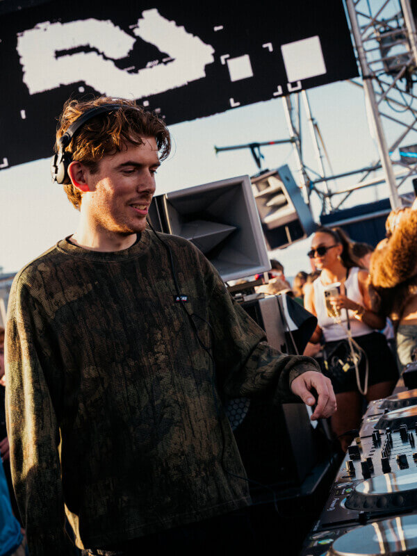 Tommy Holohan performing at AVA Belfast 2025 on The Dock stage, co-curated with Resident Advisor during sunset.